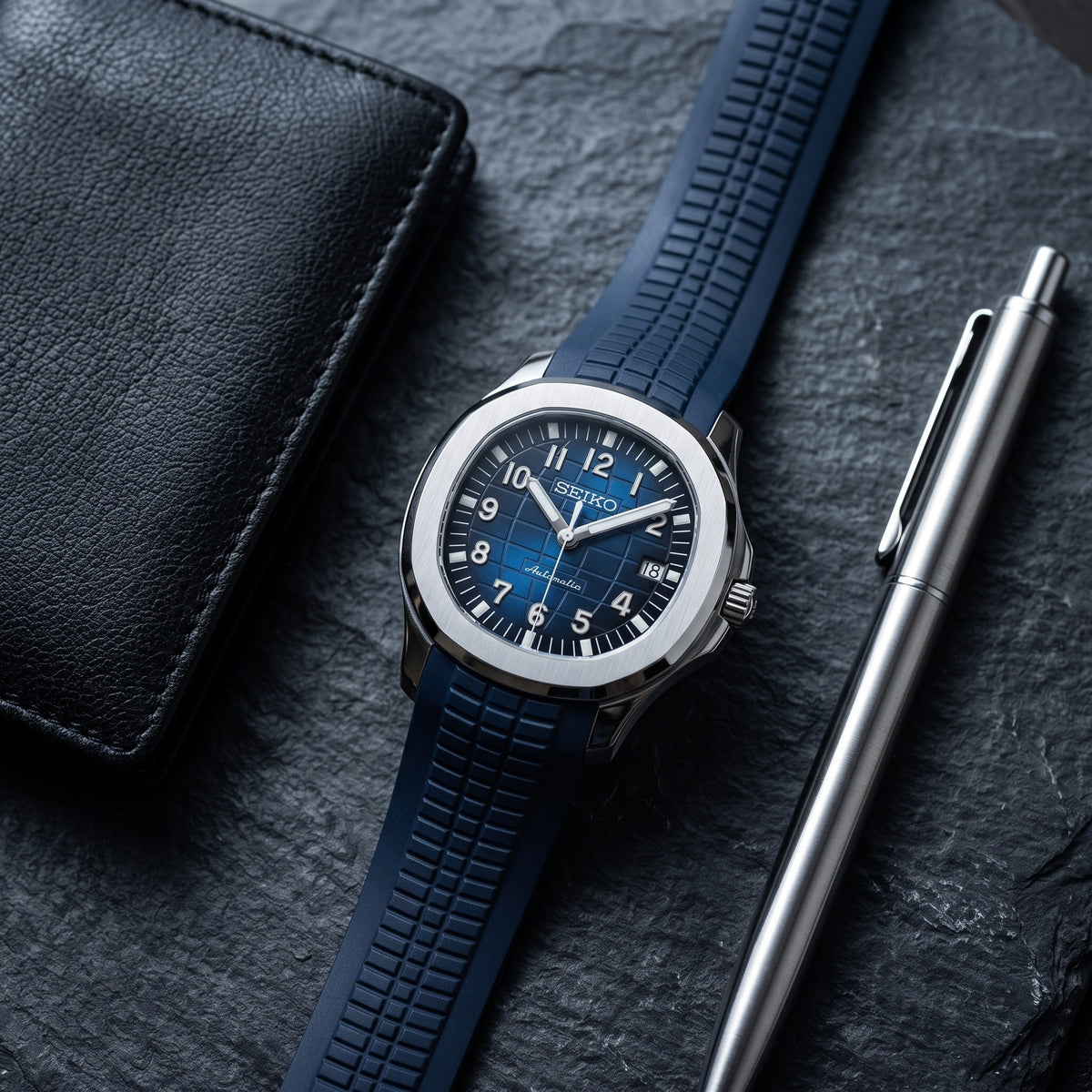 Aqua Mod – Blue Dial – 41mm – Automatic – lifestyle flat lay