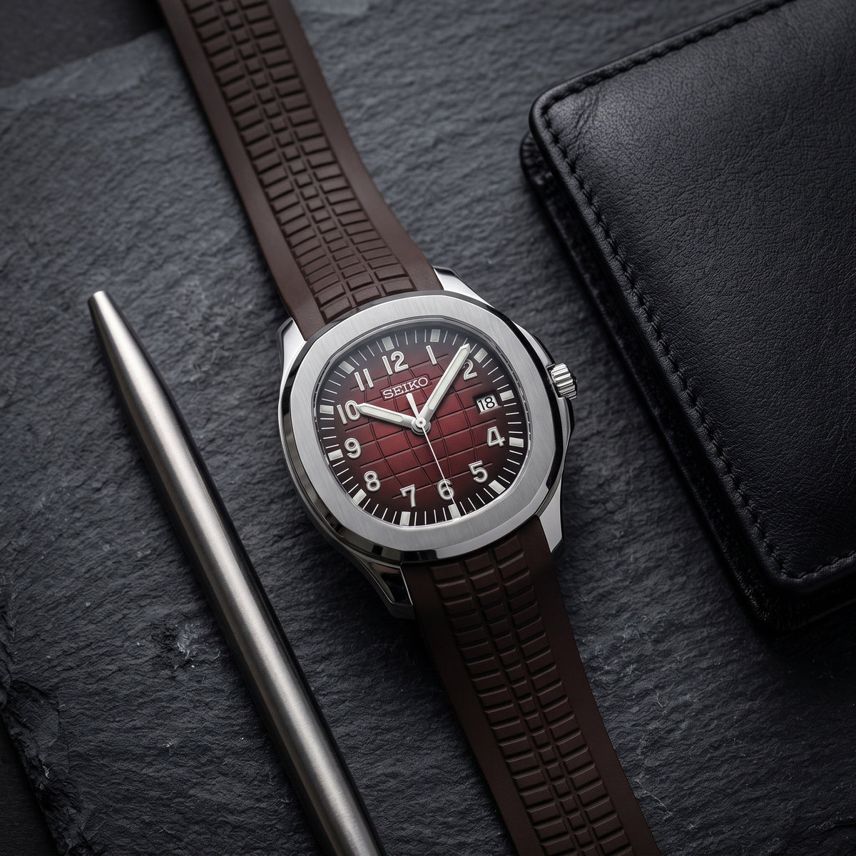 Aqua Mod – Burgundy Dial – 41mm – Automatic – lifestyle flat lay