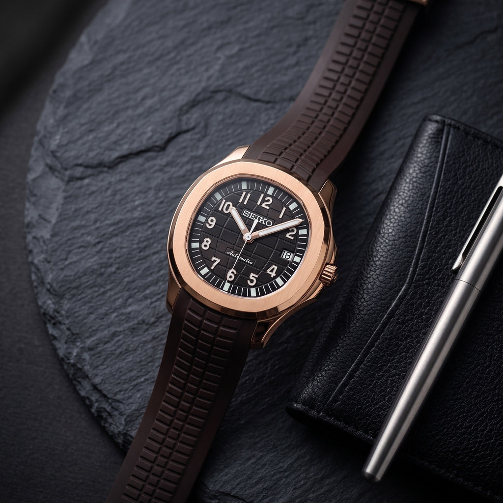 Aqua Mod – Rose Gold Black Dial – 41mm – Automatic – lifestyle flat lay