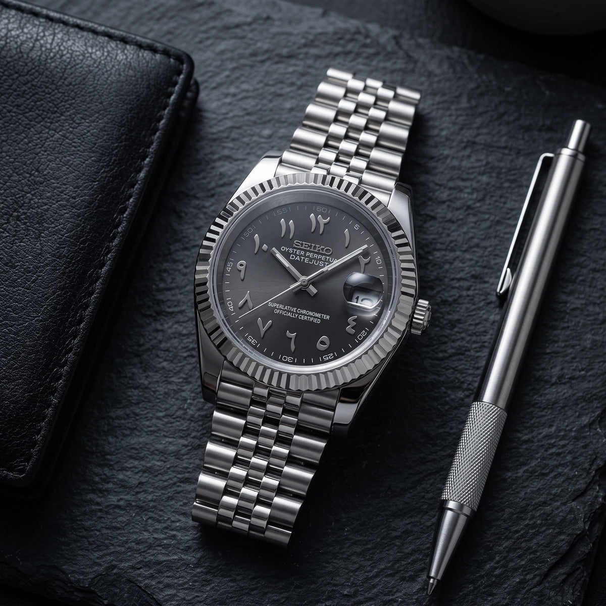 Date Mod – Steel · Black Arabic Dial – Automatic – lifestyle flat lay