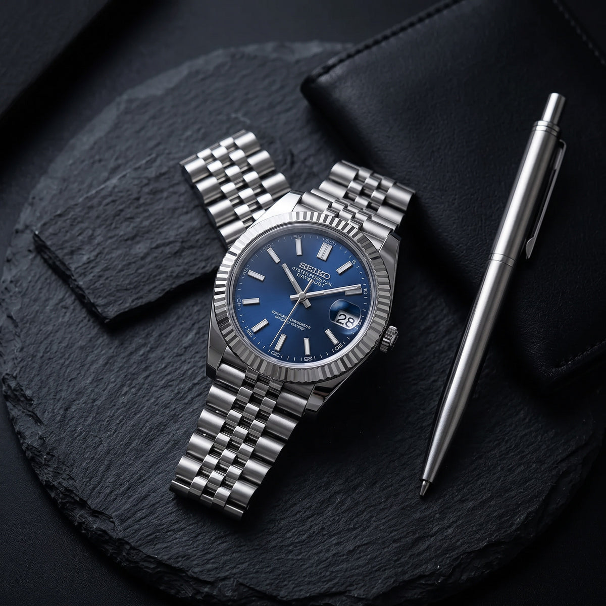Date Mod – Steel · Blue Stick Dial – Automatic – lifestyle flat lay