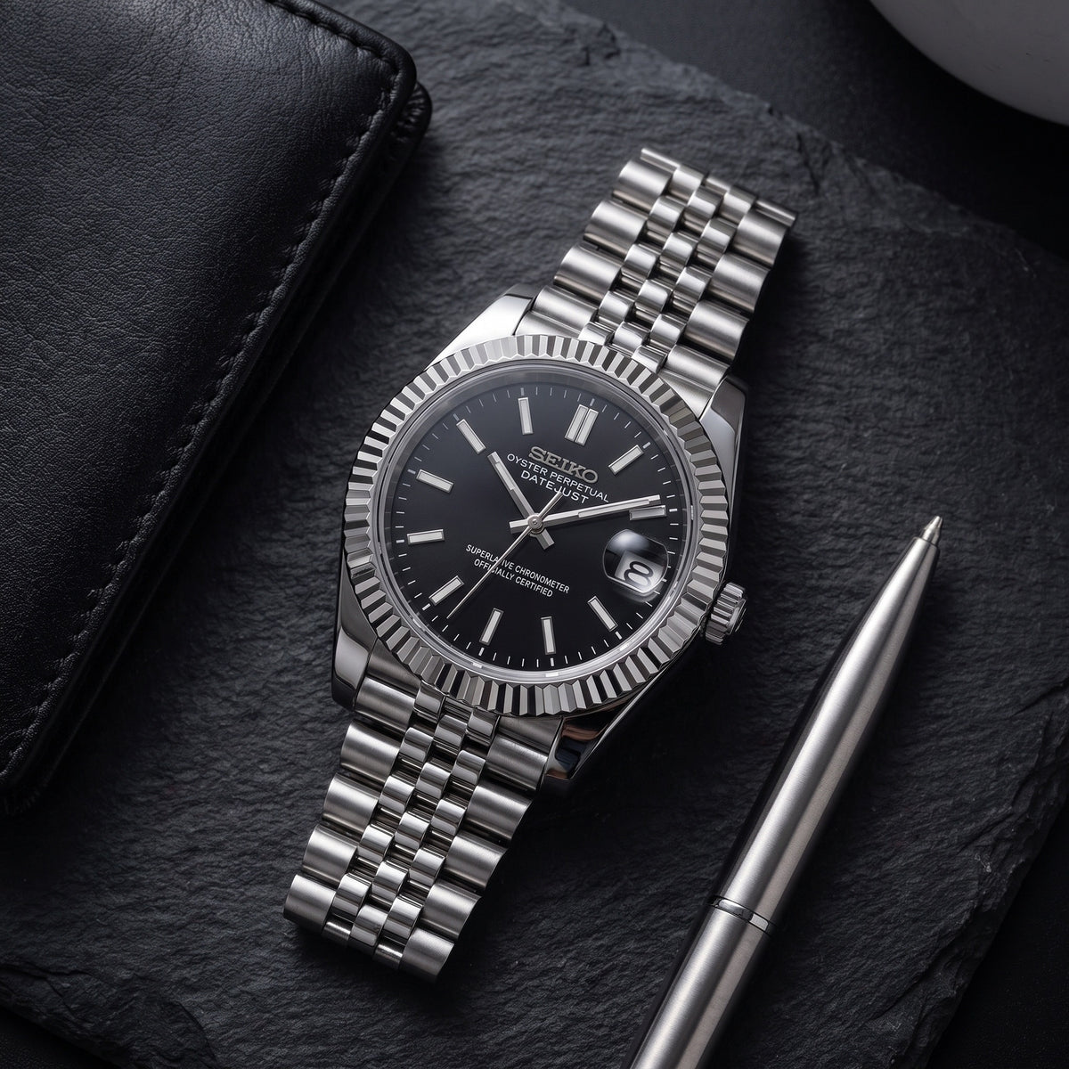 Date Mod – Steel · Grey Stick Dial – Automatic – lifestyle flat lay
