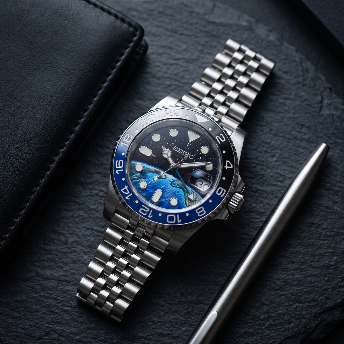 GMT Mod – Steel · Blue-Black Bezel – 40mm – Automatic GMT – lifestyle flat lay