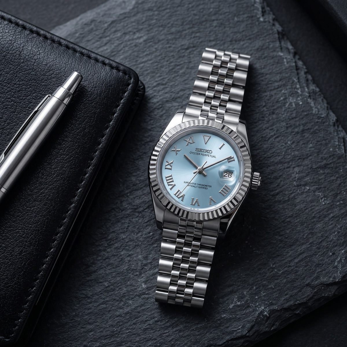 Lady Mod – Steel · Ice-Blue Roman Dial – 28mm – Automatic – lifestyle flat lay