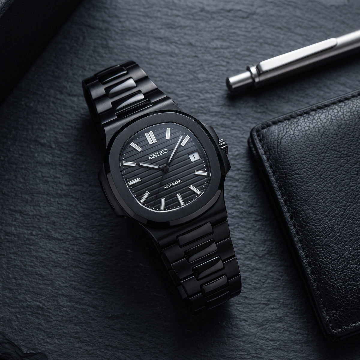 Naut Mod – Black PVD · Black Dial · Rubber – 41mm – Automatic – lifestyle flat lay