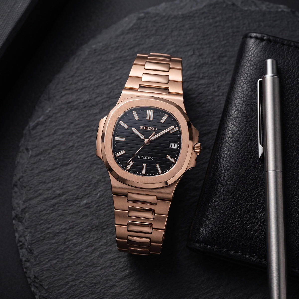 Naut Mod – Rose Gold · Black Dial – 41mm – Automatic – lifestyle flat lay