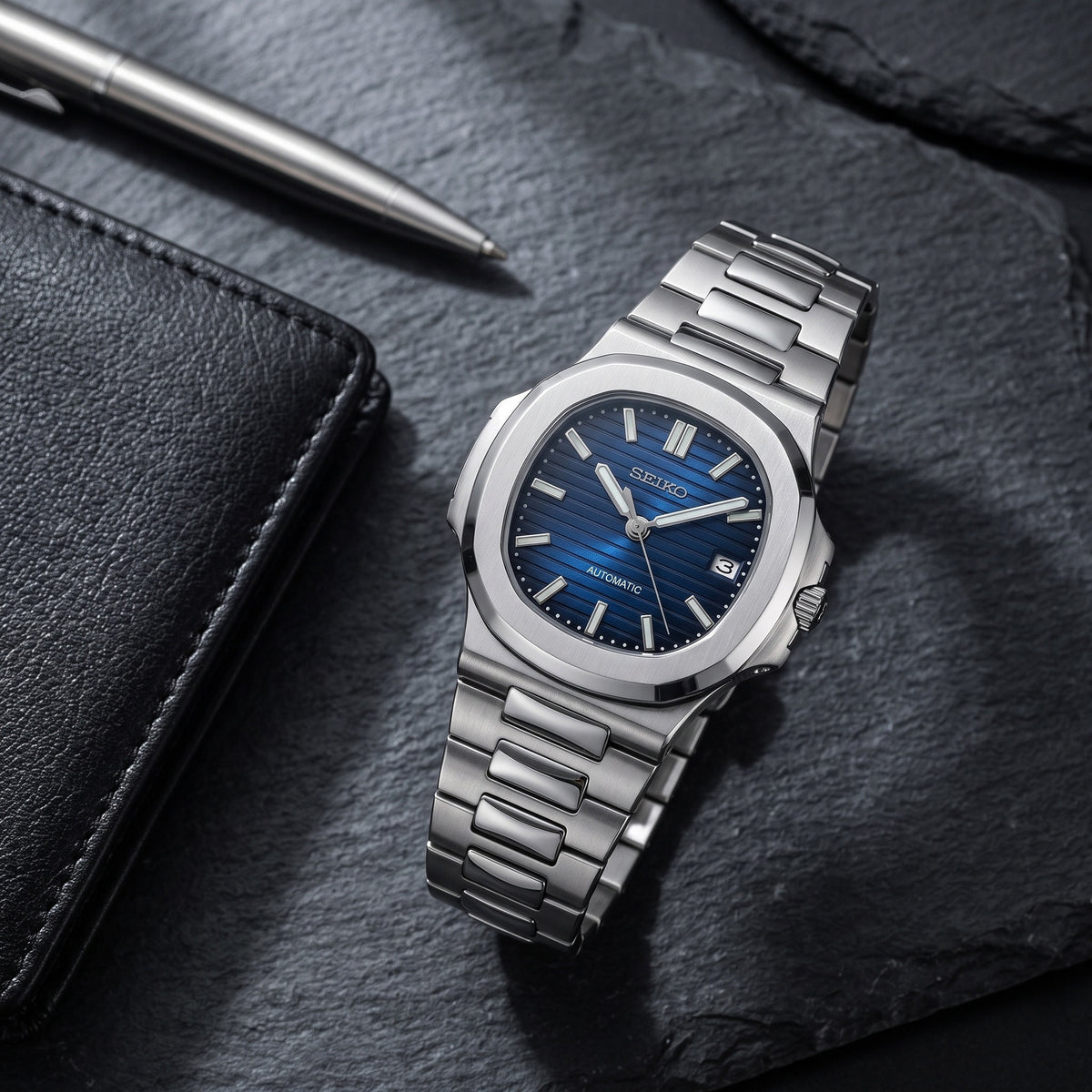 Naut Mod – Steel · Blue Dial – 41mm – Automatic – lifestyle flat lay