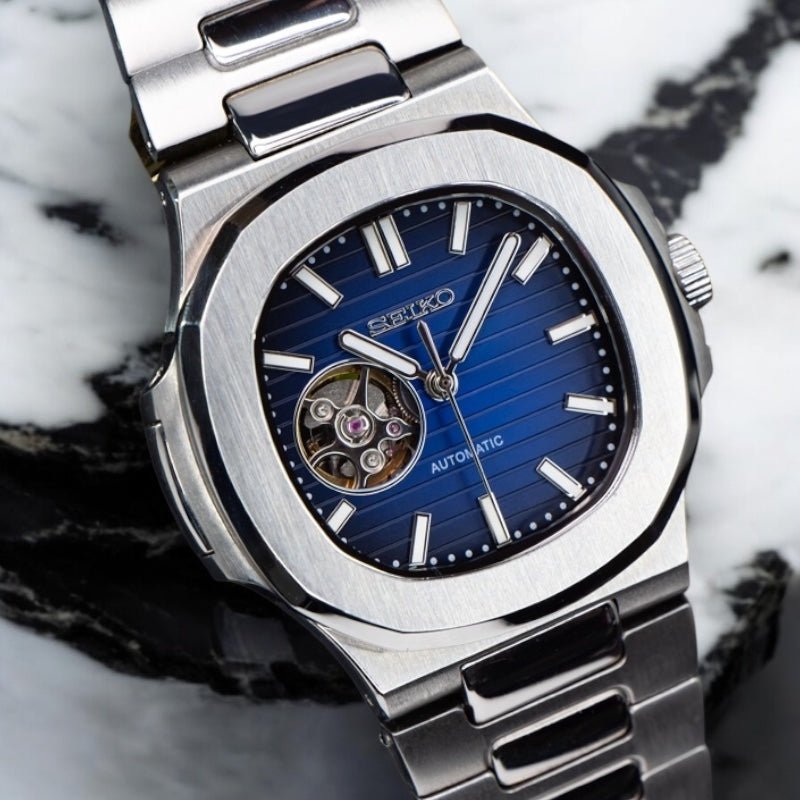 Naut Mod – Steel · Blue Open-Heart Dial – 41mm – Automatic — with Seiko logo