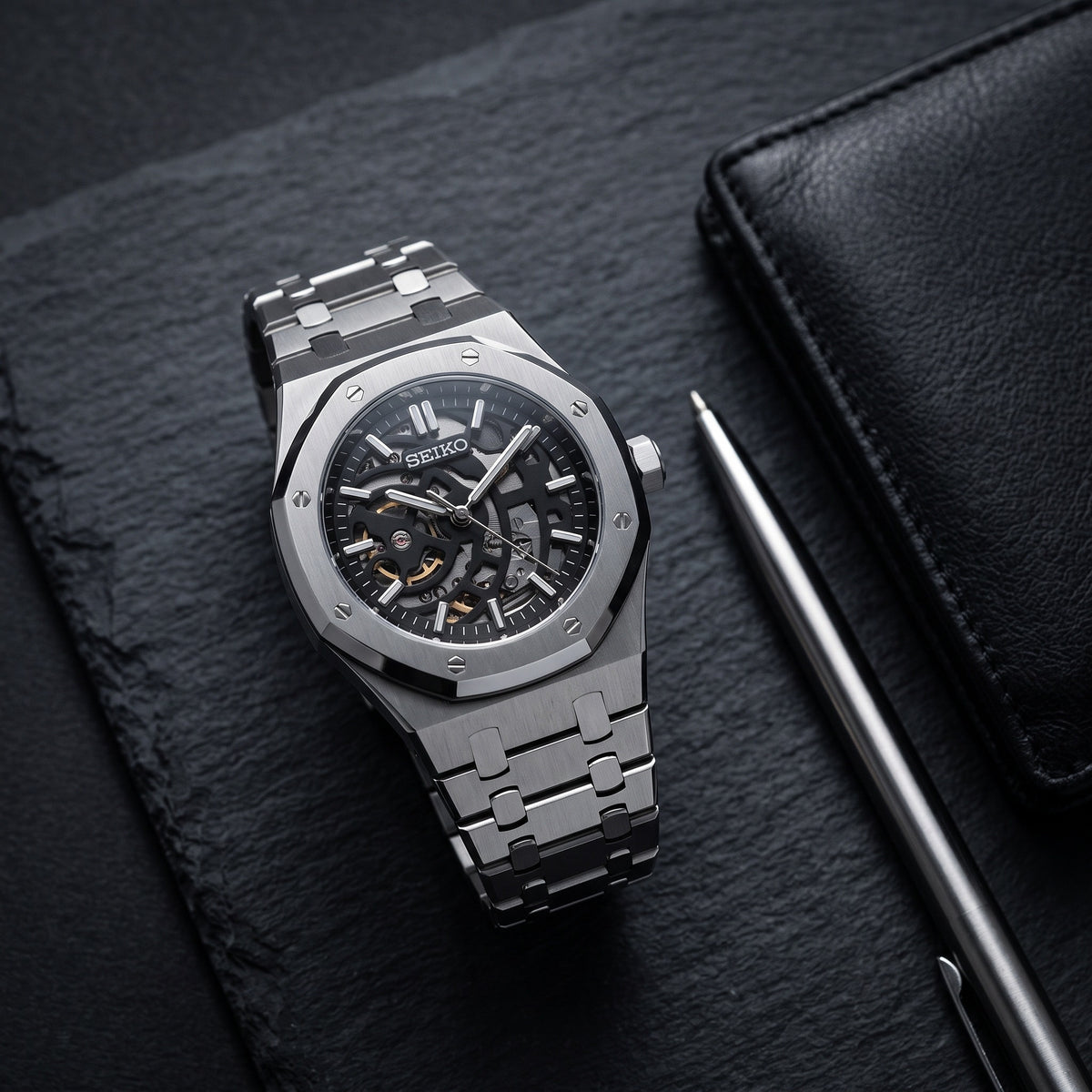 Oak Mod – Steel · Black Skeleton Dial – 41mm – Automatic – lifestyle flat lay