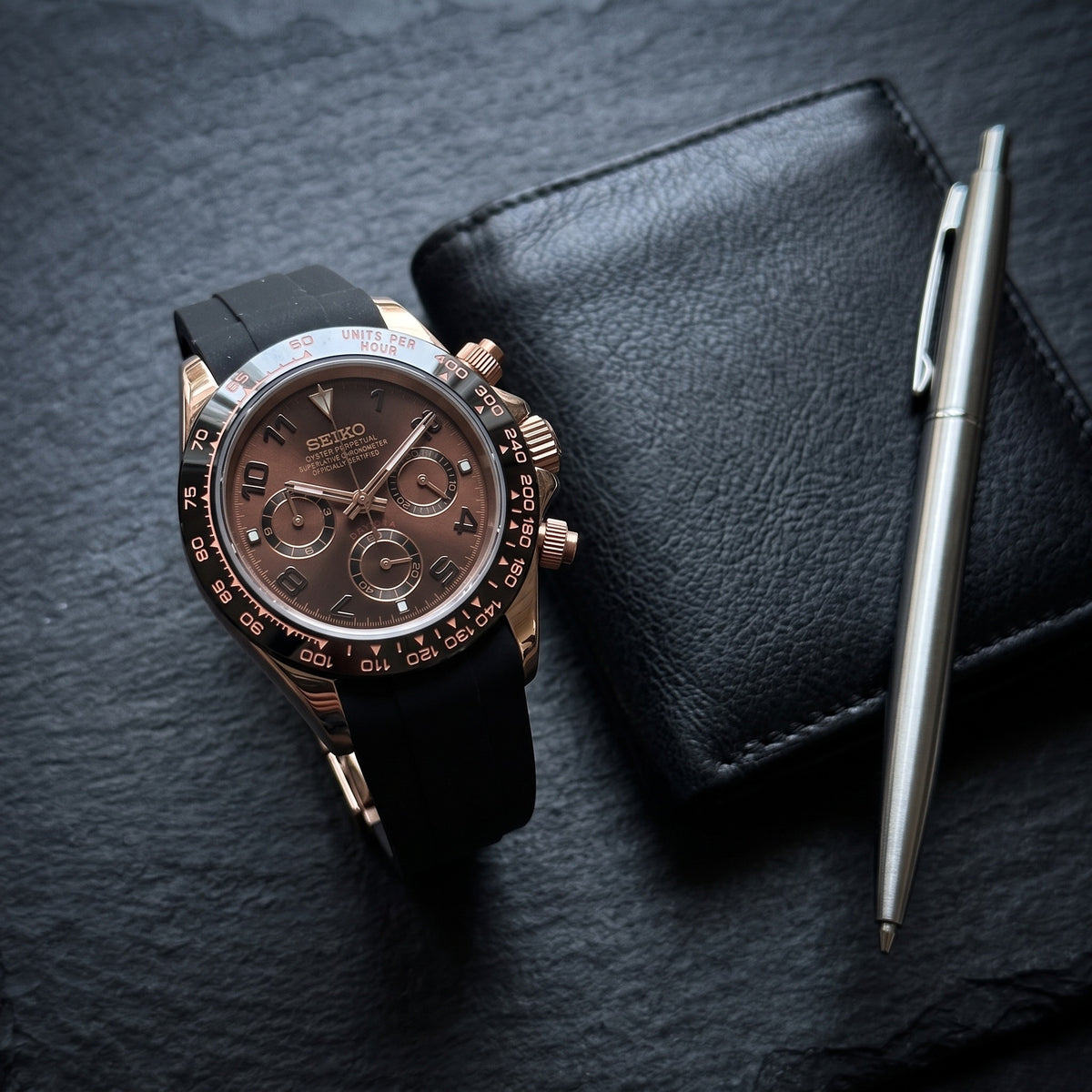 Tona Mod – Rose Gold · Brown Dial · Rubber – 40mm – Chronograph – lifestyle flat lay