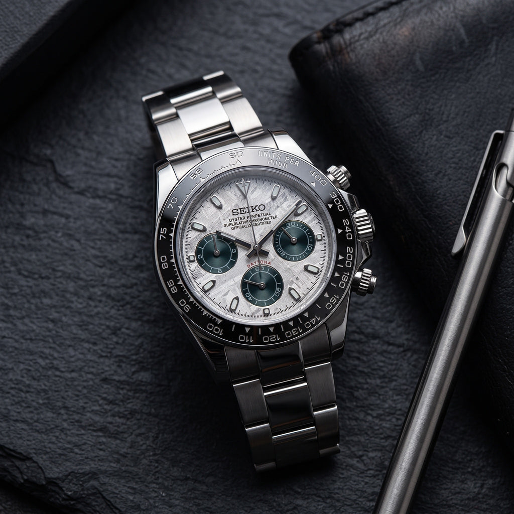 Tona Mod – Steel · White MOP Green Dial – 40mm – Chronograph – lifestyle flat lay